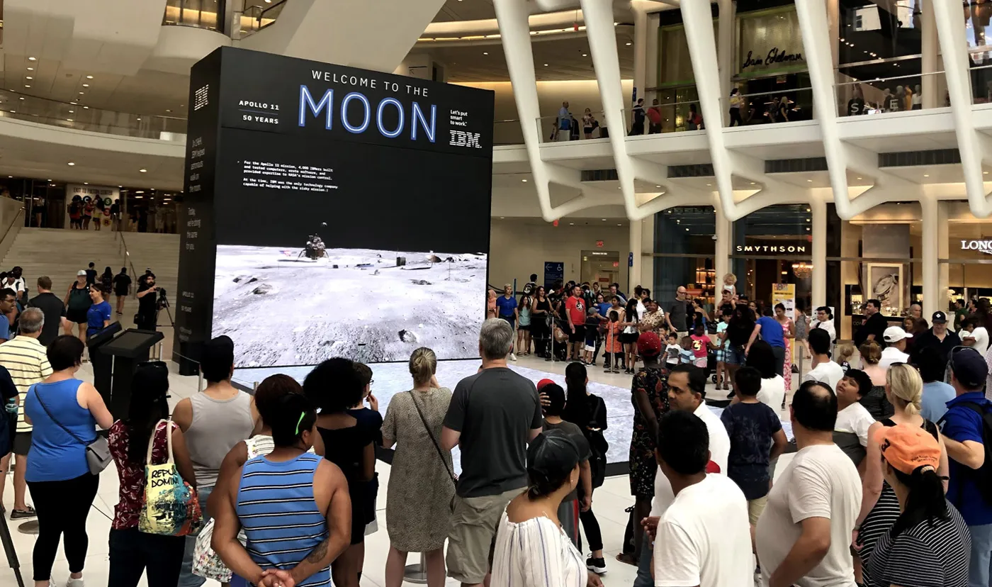 Crowd gathering at the Apollo installation